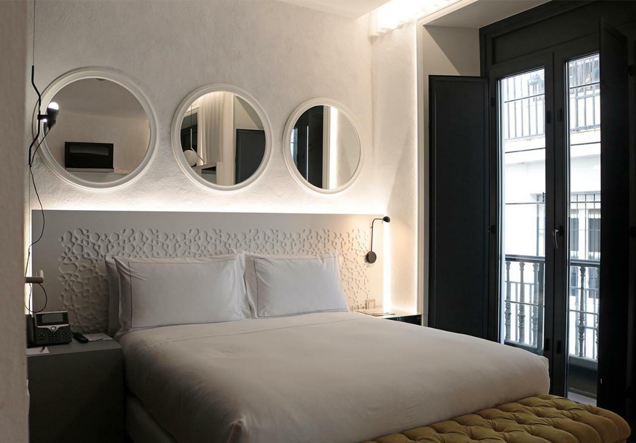 Eme Catedral Mercer Hotel Sevilla Eksteriør bilde A room at the hotel